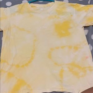 a bleached yellow shirt